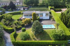 STABIO – IMMERSA NEL VERDE DELLE VIGNE, UNA DIMORA ISPIRATA AL BAUHAUS